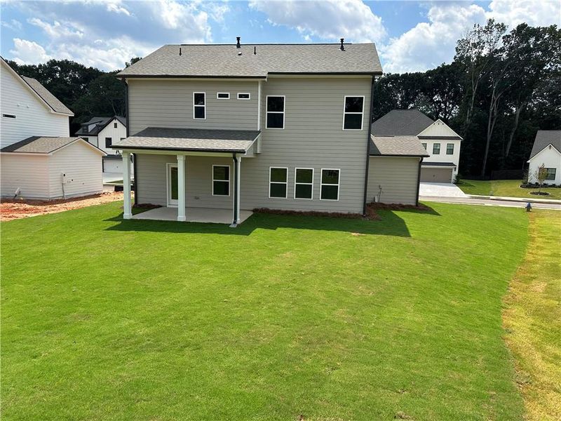Front exterior of a new home in Rosewood Lake Estates, Hoschton, GA, highlighting curb appeal (Image 82).
