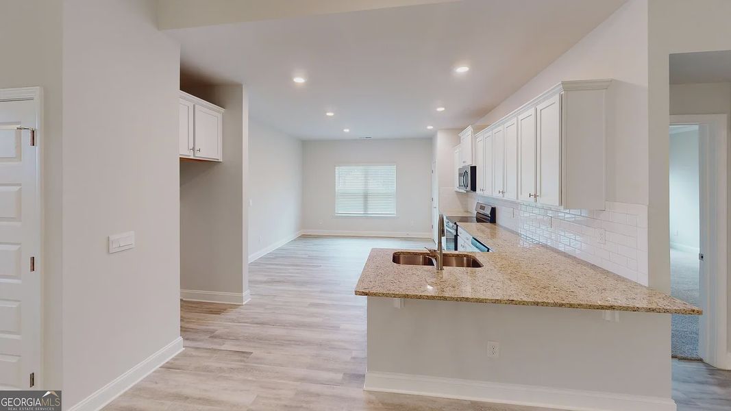 Furnished interior view inside a new home in Holliday Pass, Griffin (Image 8).