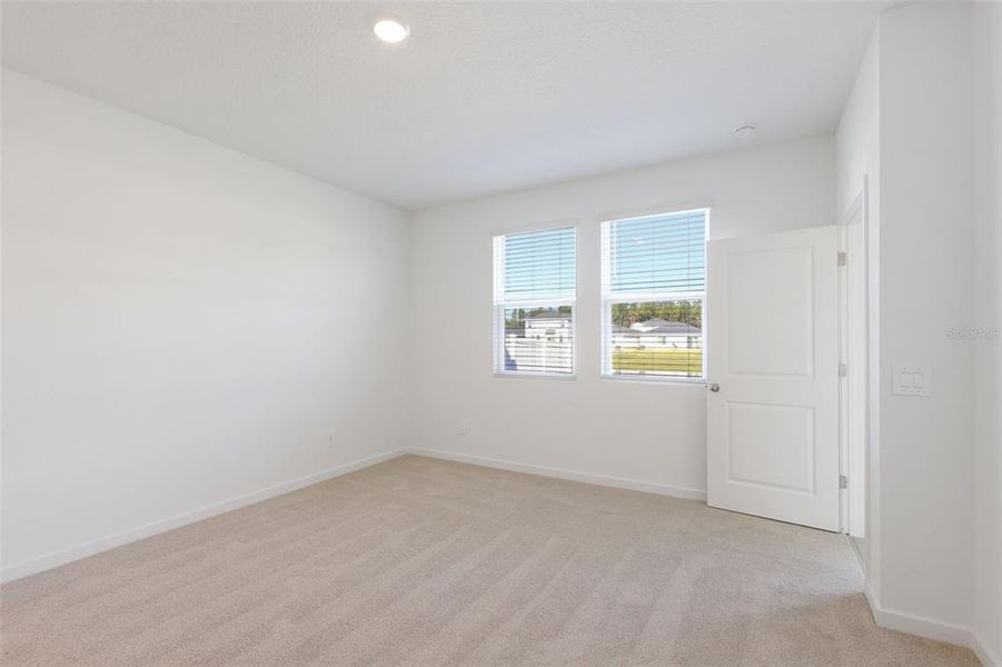 Spacious, unfurnished interior of a new home in Flagler Village - Classic Series, Palm Coast (Image 17).