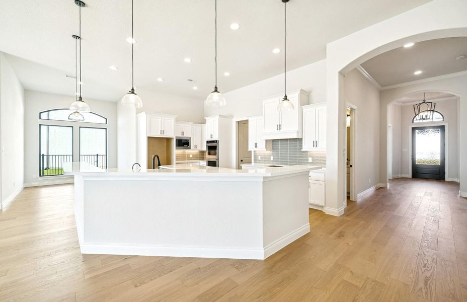Furnished interior view inside a new home in Bridgeland 60′, Cypress (Image 5).