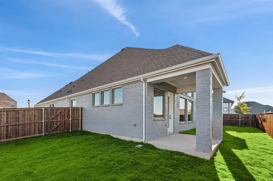Exterior details and patio area of a home in South Pointe  Village Series, Mansfield (Image 3).
