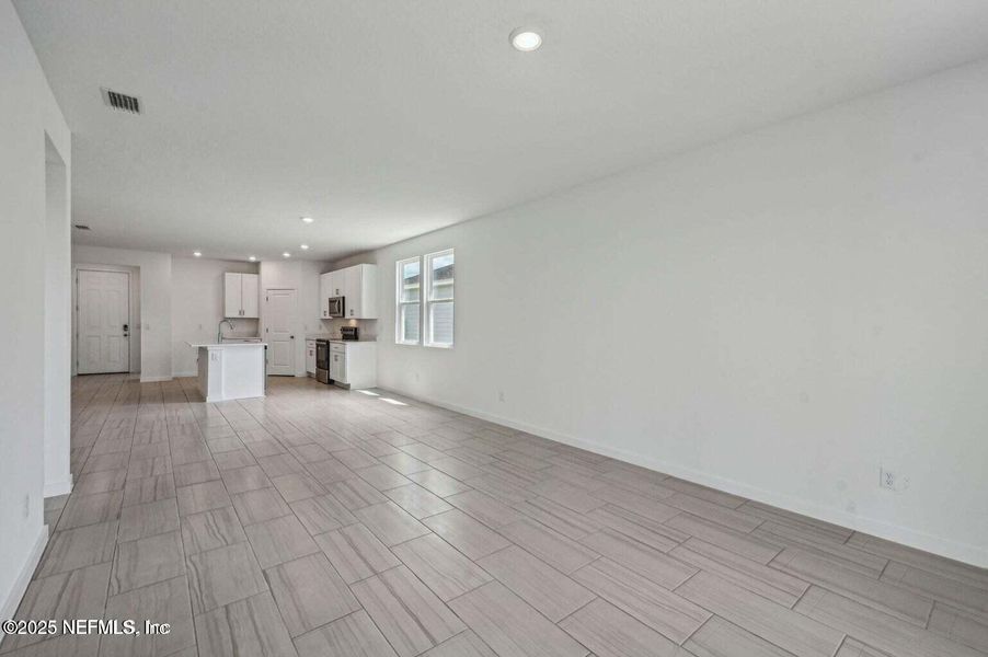 Spacious, unfurnished interior of a new home in Lakes at Bella Lago - Signature Series, Green Cove Springs (Image 20).