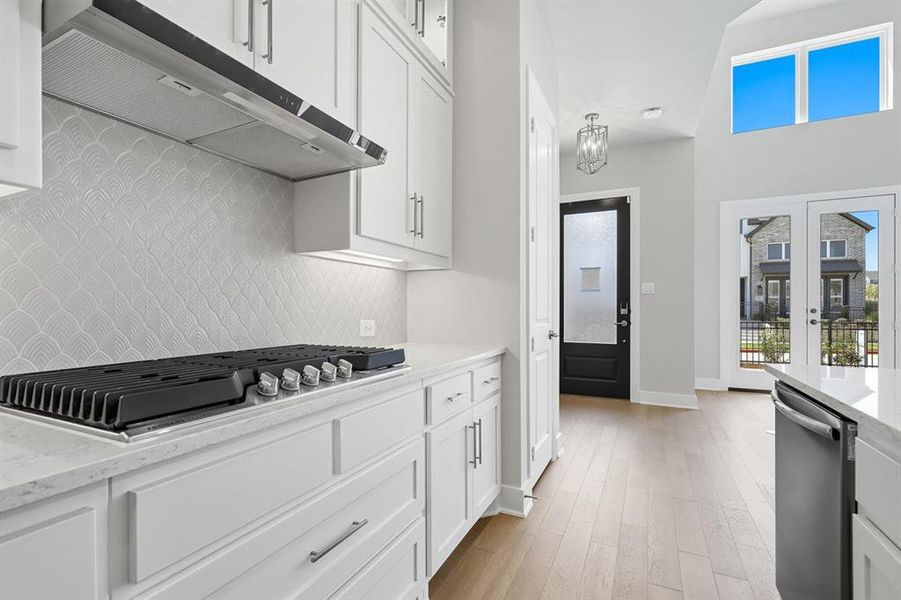 Furnished interior view inside a new home in Walsh: Townhomes - The Patios, Aledo (Image 16). Furnished interior view inside a new home in Walsh: Townhomes - The Patios, Aledo (Image 16).