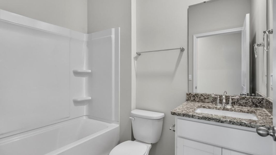 Furnished interior view inside a new home in Magnolia Ridge at Blake Farm, Wilmington (Image 11).