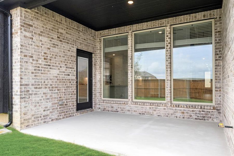 Exterior details and patio area of a home in Creekview Meadows, Pilot Point (Image 3). Exterior details and patio area of a home in Creekview Meadows, Pilot Point (Image 3).