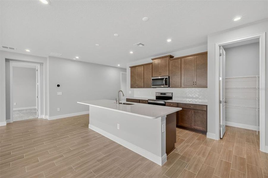 Furnished interior view inside a new home in Windwater, Parrish (Image 12).
