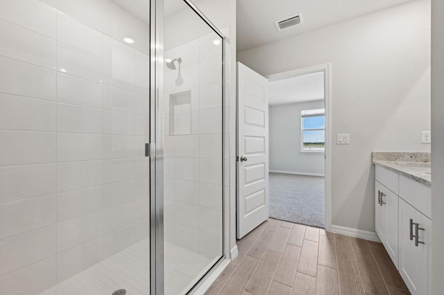 Spacious, unfurnished interior of a new home in Hampton Park - Classic Series, Vero Beach (Image 26).