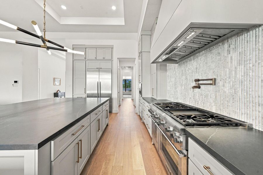 Dual counter space and a direct path to the dining area make it as practical as it is beautiful.