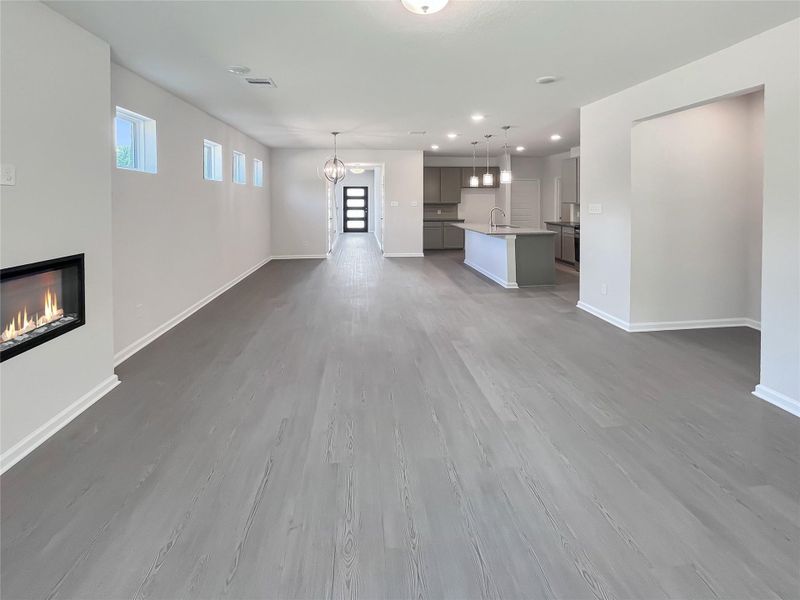 The Robin II- Family Room with Linear Electric FireplaceSample image to be used for example only.