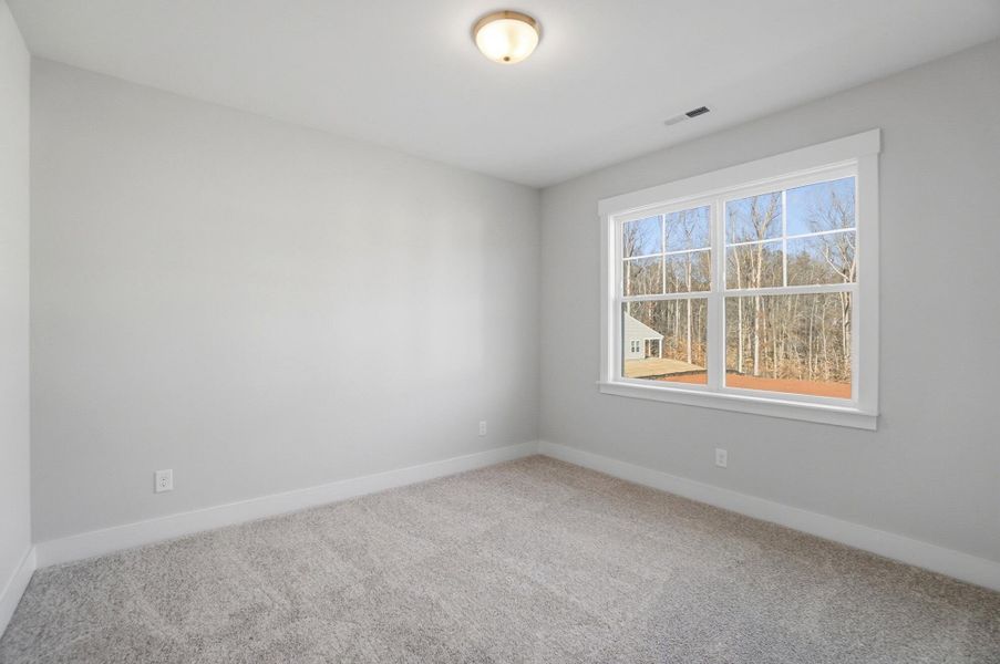 Spacious, unfurnished interior of a new home in Rone Creek, Waxhaw (Image 73).