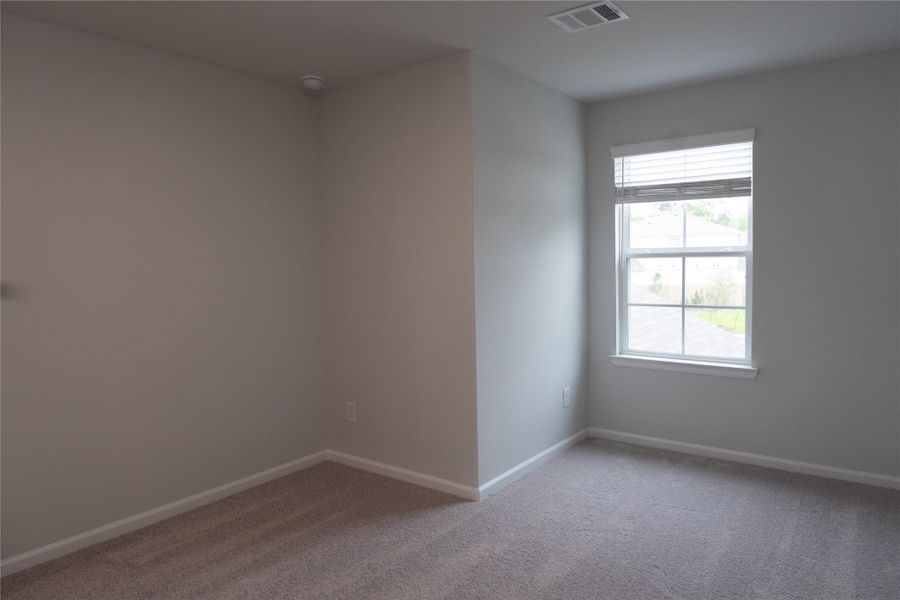 Spacious, unfurnished interior of a new home in Lakes at Black Oak, Magnolia (Image 14).
