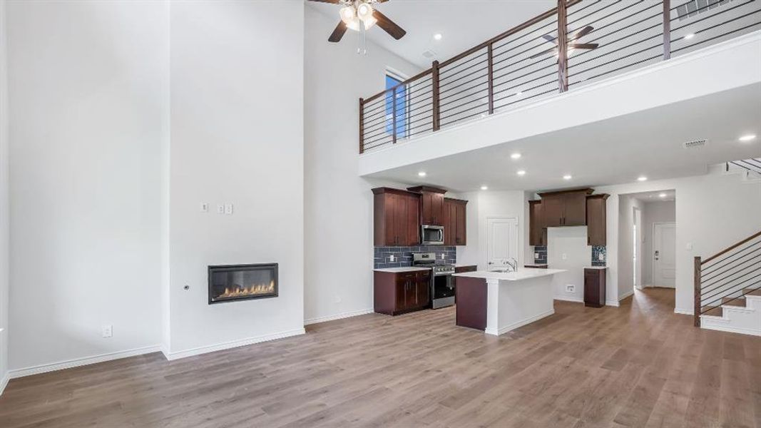 Furnished interior view inside a new home in The Landing at Hidden Lakes, McKinney (Image 9). Furnished interior view inside a new home in The Landing at Hidden Lakes, McKinney (Image 9).