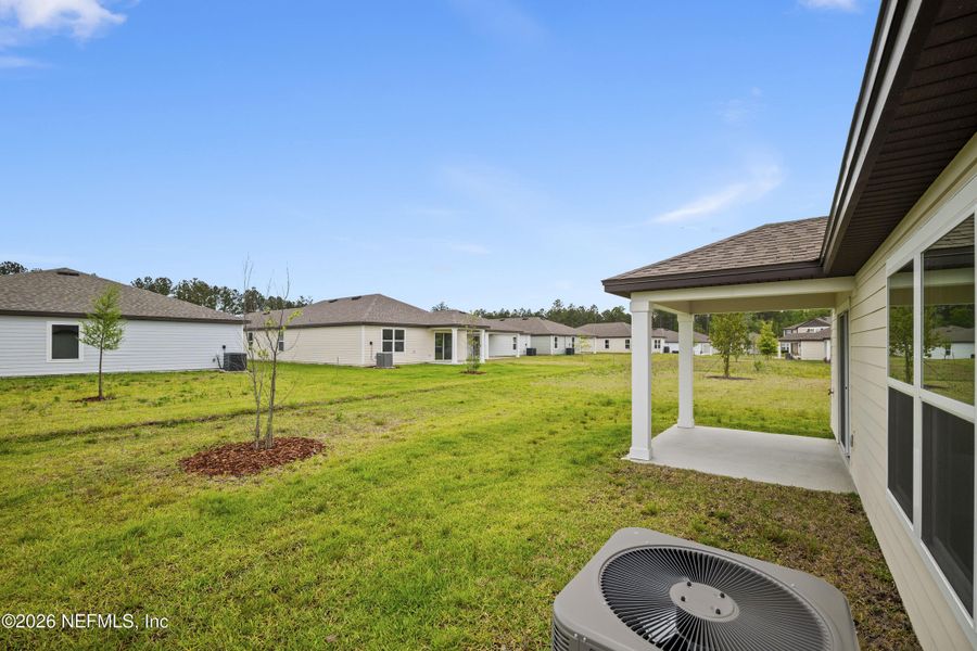 Exterior details and patio area of a home in Westport Landing, Jacksonville (Image 3).