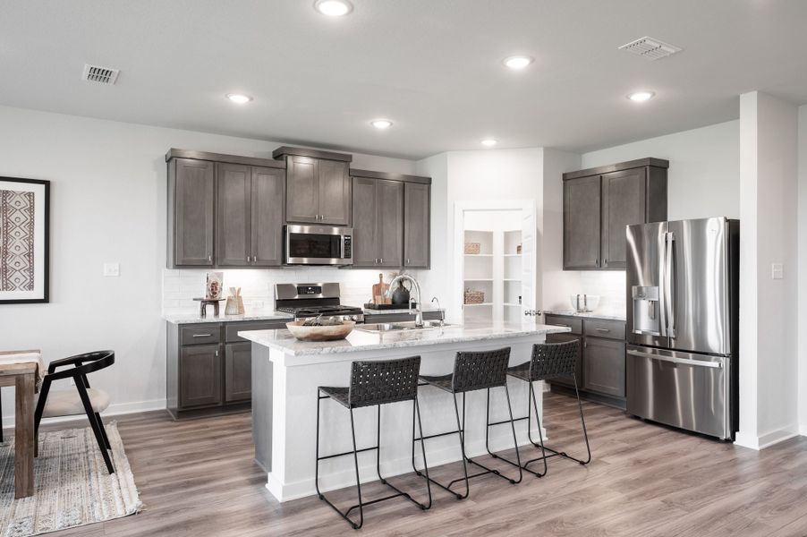 Furnished interior view inside a new home in Mason Woods, Cypress (Image 7).