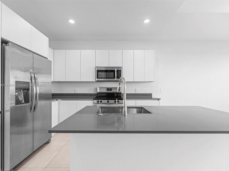 Furnished interior view inside a new home in , Homestead (Image 8). Furnished interior view inside a new home in , Homestead (Image 8).