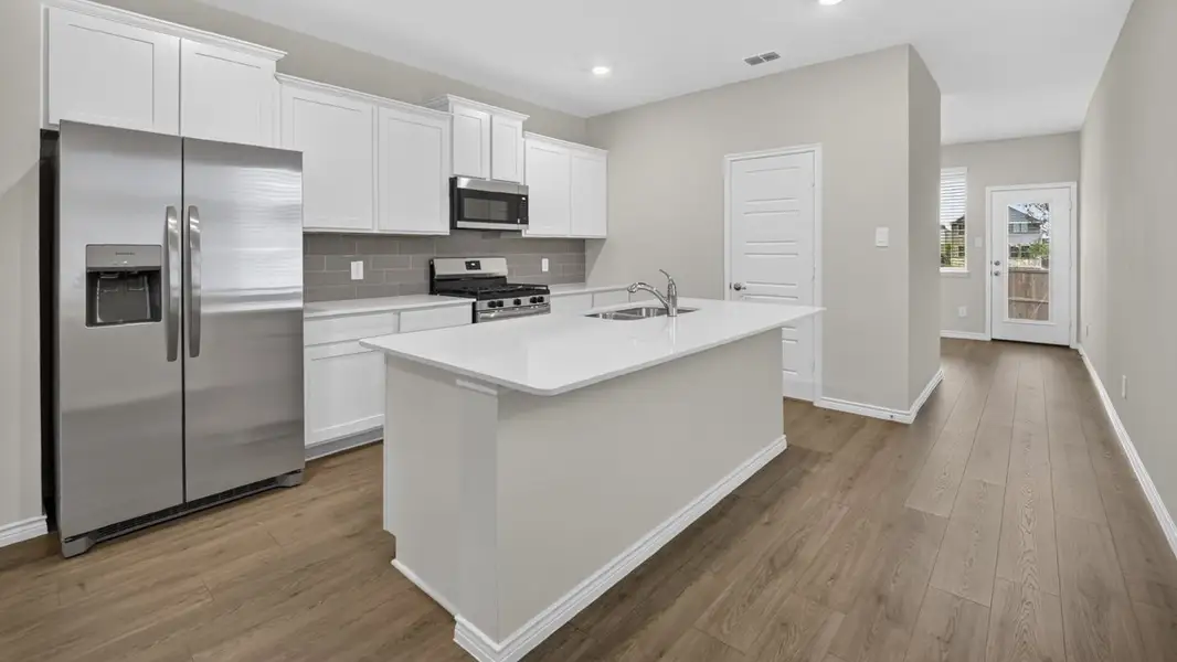 Furnished interior view inside a new home in Magnolia at Legacy Hills, Celina (Image 3).