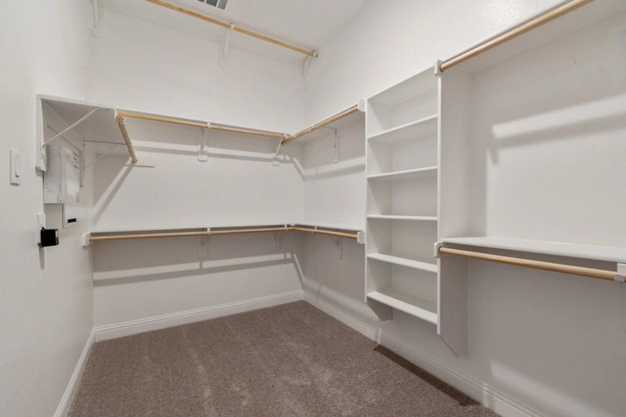 Walk-In Closet | Concept 2586 at Hidden Creek Estates in Van Alstyne, TX by Landsea Homes