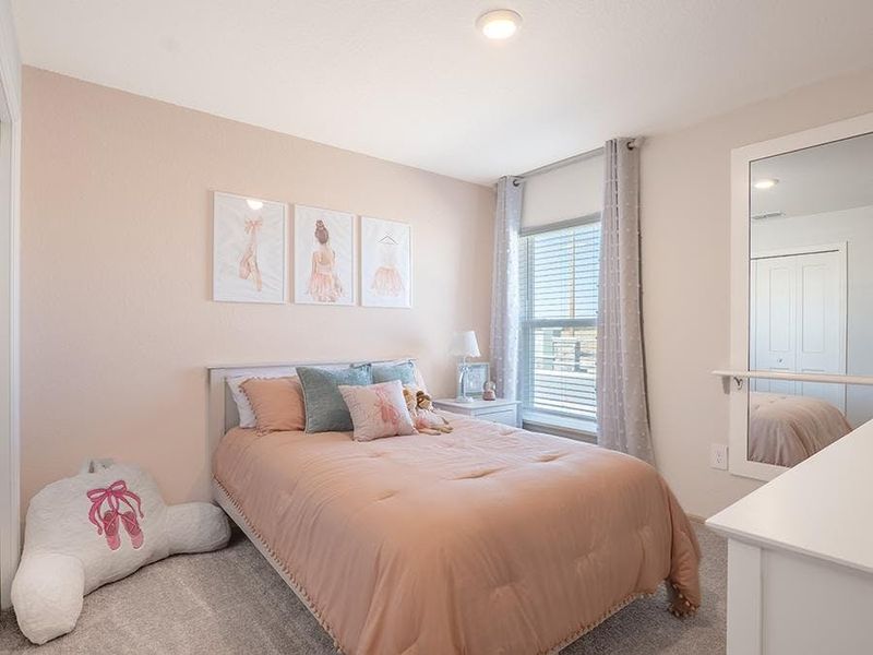 Secondary bedrooms provide space for everyone in your household - Raychel by Highland Homes Secondary bedrooms provide space for everyone in your household - Raychel by Highland Homes
