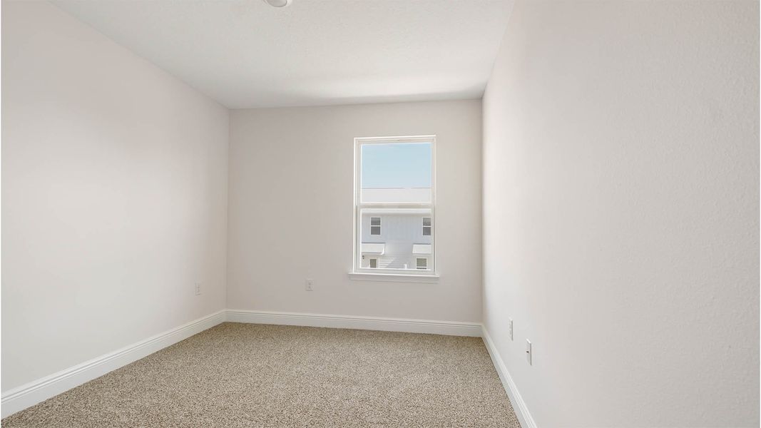 Spacious, unfurnished interior of a new home in Bayside at Ward Creek, Panama City Beach (Image 32).