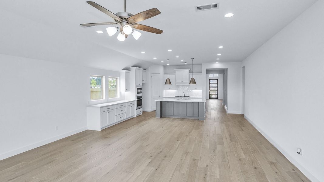 Representative unfurnished interior of a home built from the 2504W by Perry Homes in La Cima, San Marcos (Image 19).