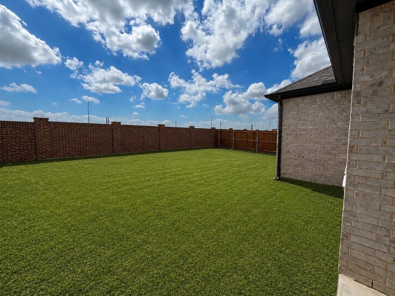 Exterior details and patio area of a home in Wildflower Ranch, Fort Worth (Image 13).