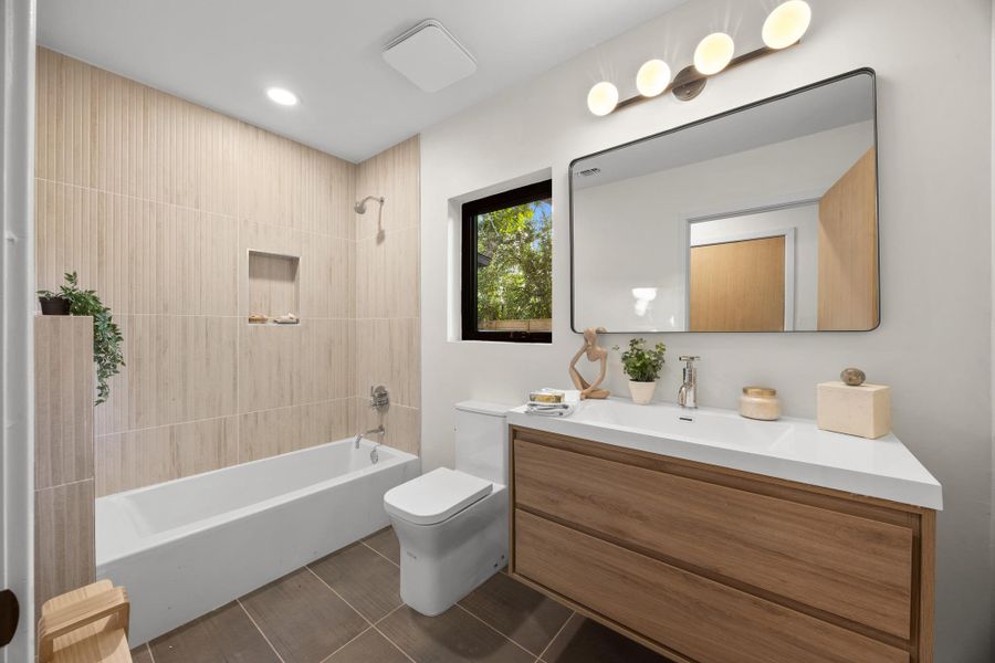 Full bathroom shared by bedrooms 3 and 4 Full bathroom shared by bedrooms 3 and 4