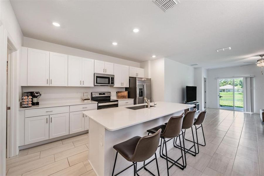 Furnished interior view inside a new home in Park East, Plant City (Image 27).