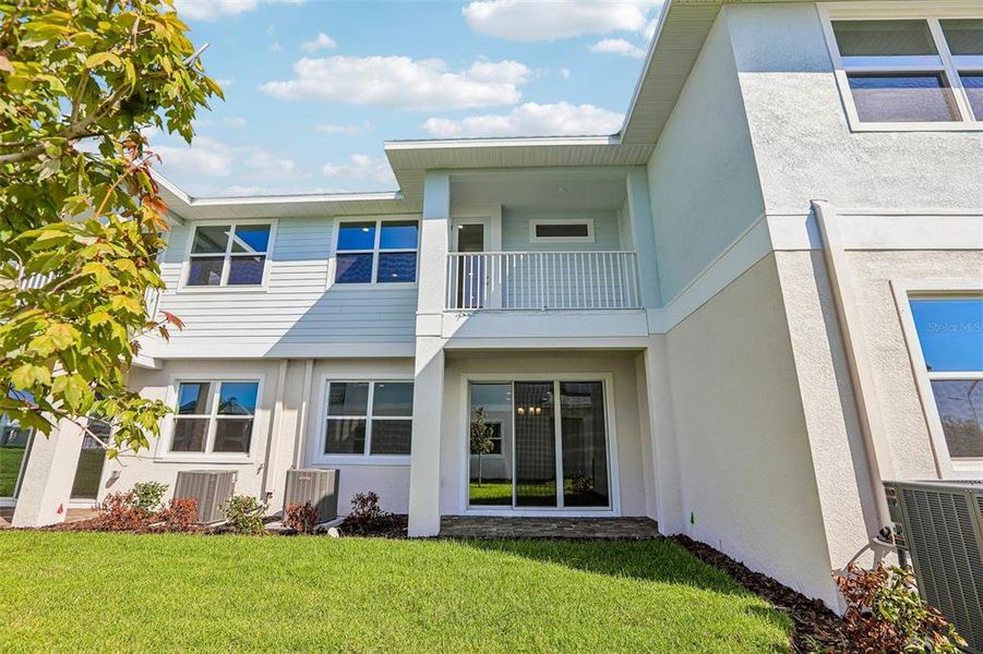 Exterior details and patio area of a home in Lagoon Residences at Epperson, Wesley Chapel (Image 26).