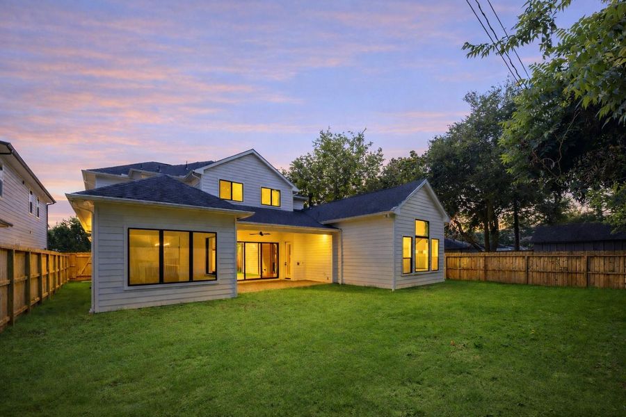 Expansive backyard with room to roam, flanked by privacy fencing and mature trees, perfect canvas for a pool, garden, or play space. Expansive backyard with room to roam, flanked by privacy fencing and mature trees, perfect canvas for a pool, garden, or play space.