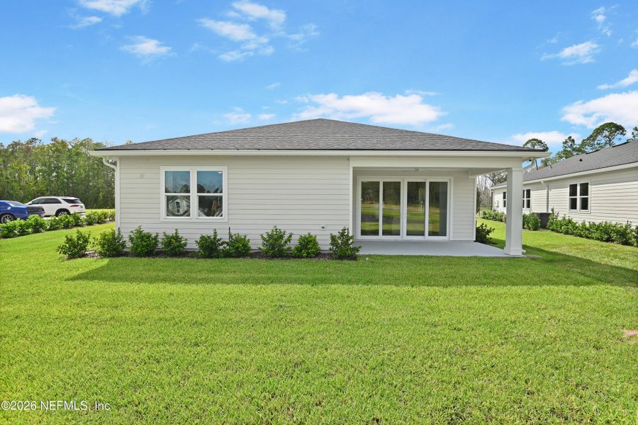 Exterior details and patio area of a home in Woodbridge, Fernandina Beach (Image 19). Exterior details and patio area of a home in Woodbridge, Fernandina Beach (Image 19).