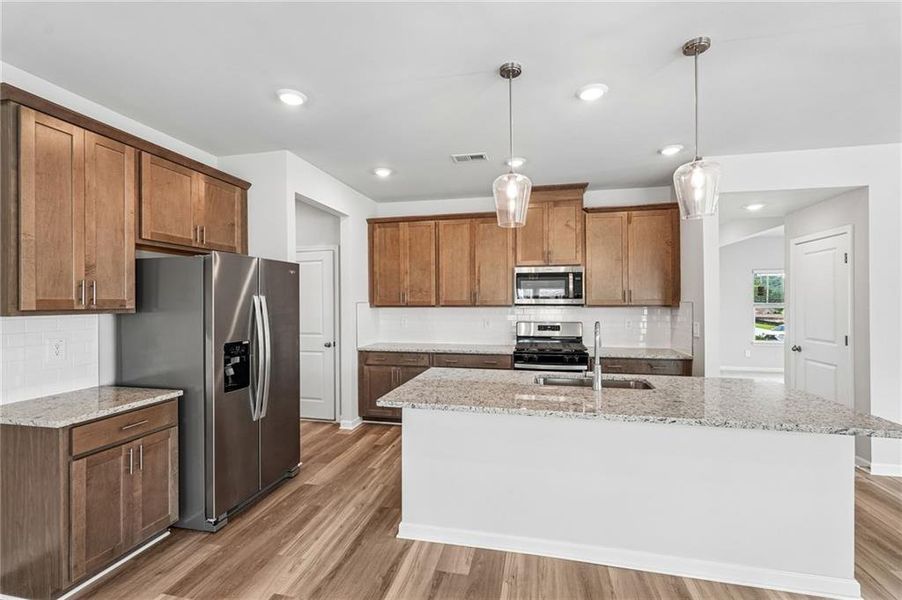 Furnished interior view inside a new home in Northwoods at Mirror Lake, Villa Rica (Image 10).