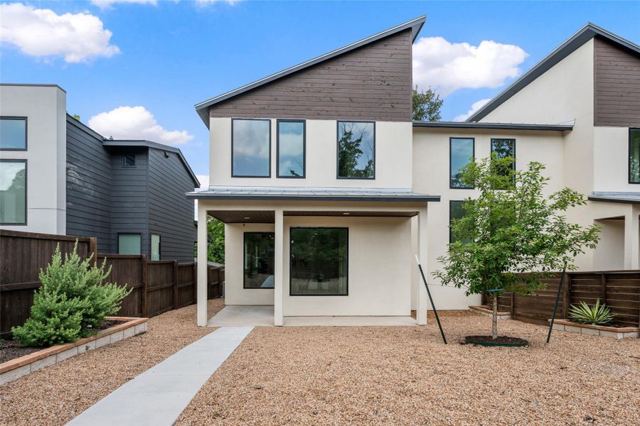 Front exterior of a new home in , Austin, TX, highlighting curb appeal (Image 1). Front exterior of a new home in , Austin, TX, highlighting curb appeal (Image 1).