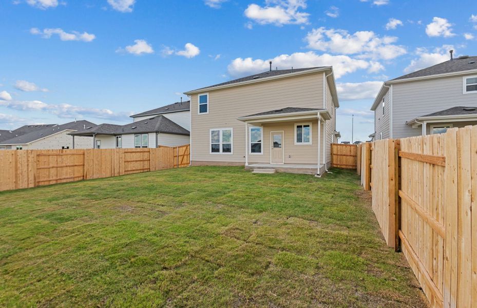 Exterior details and patio area of a home in Patterson Ranch, Georgetown (Image 22).