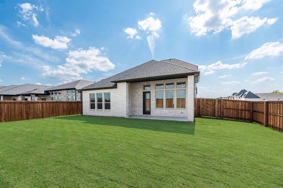 Exterior details and patio area of a home in Devonshire, Heath (Image 4).
