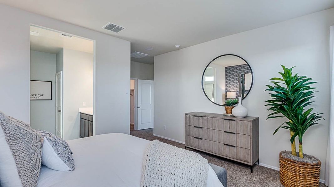 Representative furnished interior of a home built from the Palo Verde by D.R. Horton in The Lakes at Rancho El Dorado, Maricopa (Image 18).