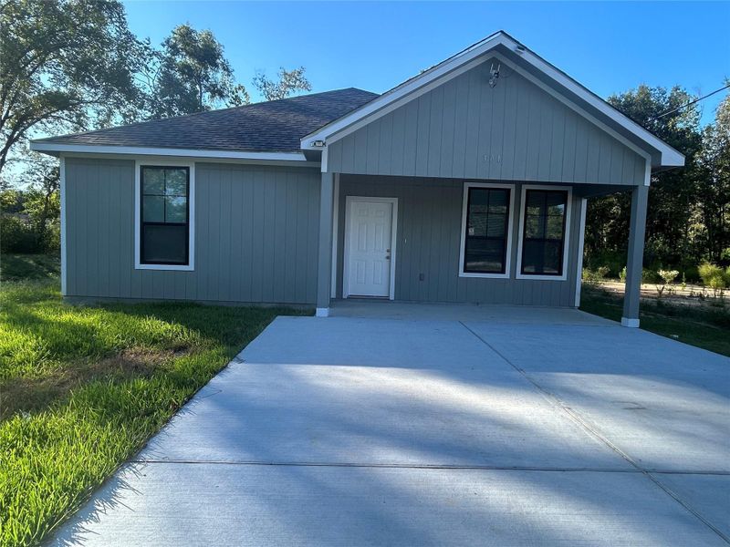 Front exterior of a new home in , Shepherd, TX, highlighting curb appeal (Image 2). Front exterior of a new home in , Shepherd, TX, highlighting curb appeal (Image 2).