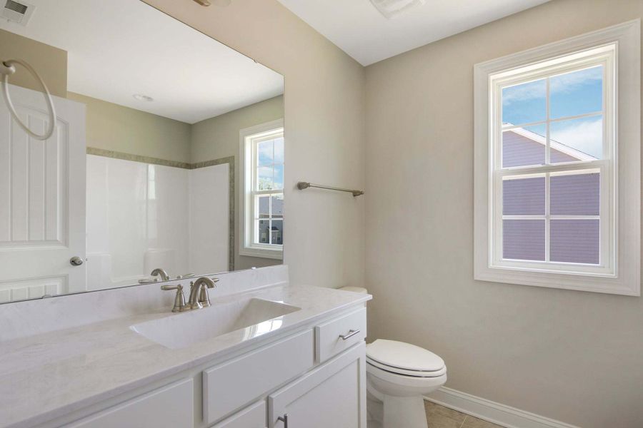 Representative furnished interior of a home built from the Clayton by Caviness & Cates Communities in Bartlett Manor, Youngsville (Image 212).