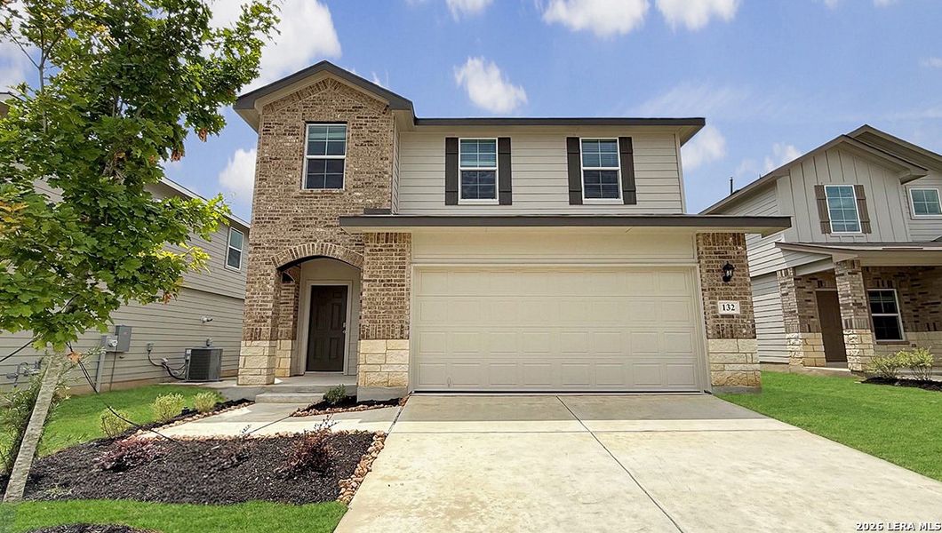 Front exterior of a new home in Redbird Ranch, San Antonio, TX, highlighting curb appeal (Image 2). Front exterior of a new home in Redbird Ranch, San Antonio, TX, highlighting curb appeal (Image 2).