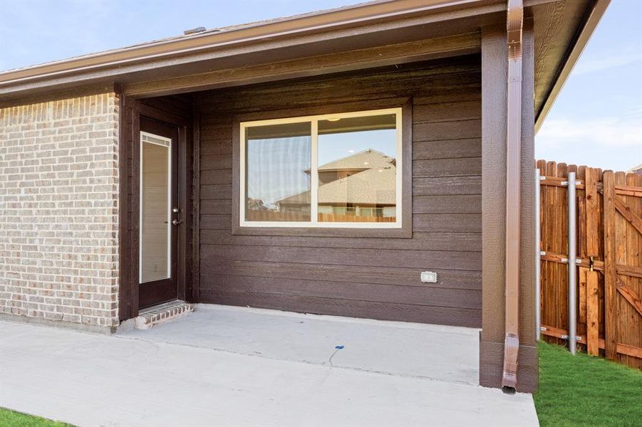 Exterior details and patio area of a home in Bear Creek Elements, Lavon (Image 4).