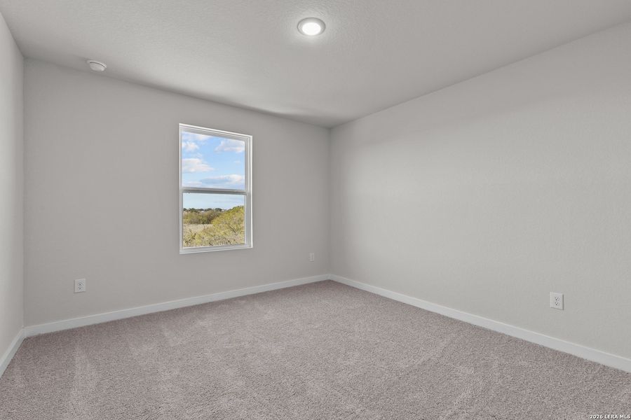 Spacious, unfurnished interior of a new home in Hacienda, San Antonio (Image 11).