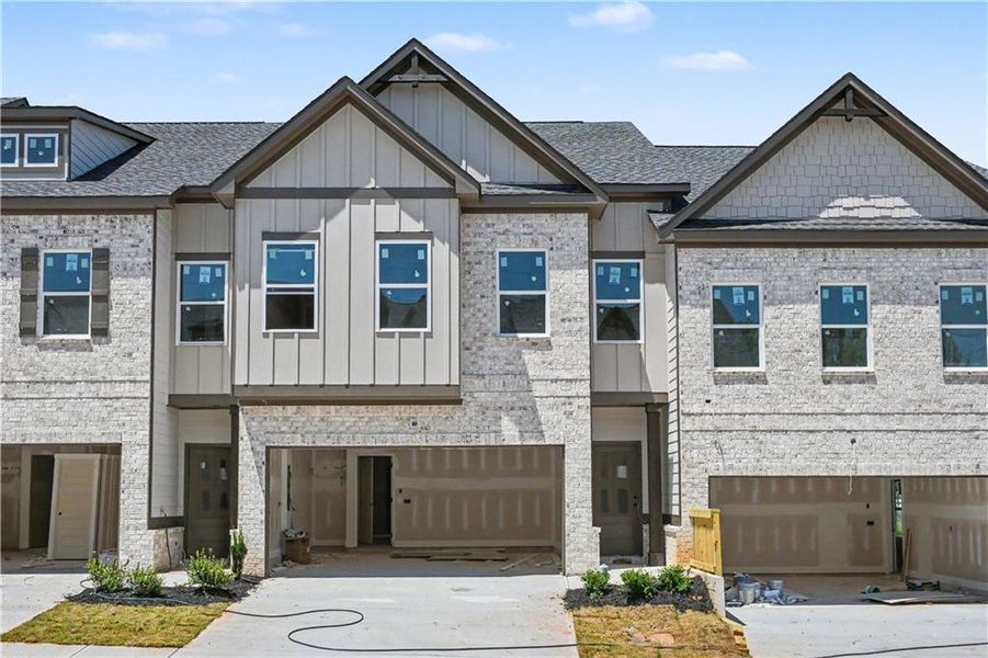 Front exterior of a new home in , Norcross, GA, highlighting curb appeal (Image 2). Front exterior of a new home in , Norcross, GA, highlighting curb appeal (Image 2).