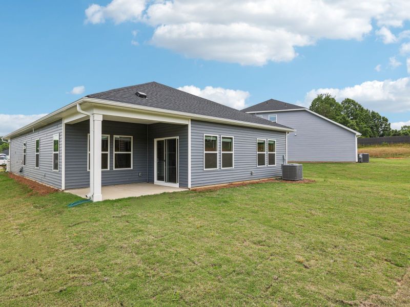 Exterior details and patio area of a home in Nelson's Creek, Mocksville (Image 2). Exterior details and patio area of a home in Nelson's Creek, Mocksville (Image 2).