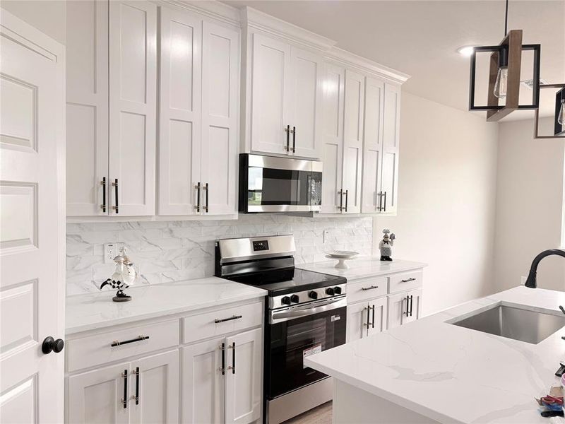 Furnished interior view inside a new home in , Quinlan (Image 13).