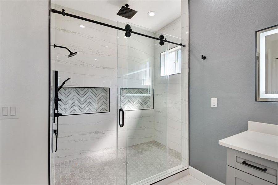 Walk in Master bath shower rain feature multiple upgrades