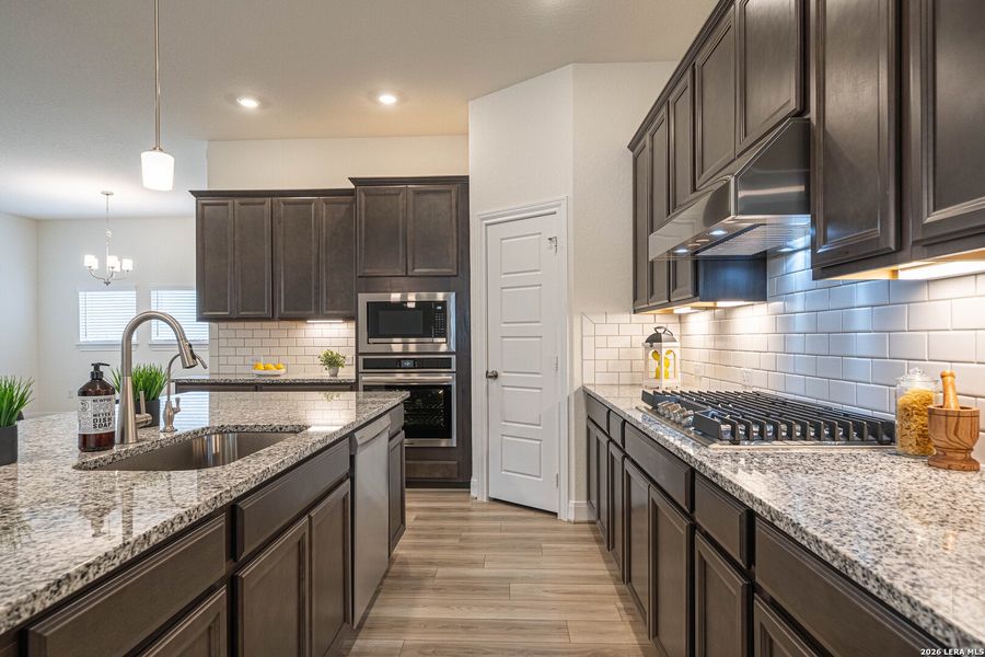 Furnished interior view inside a new home in Ladera - Laurel Hollow 60', San Antonio (Image 6).