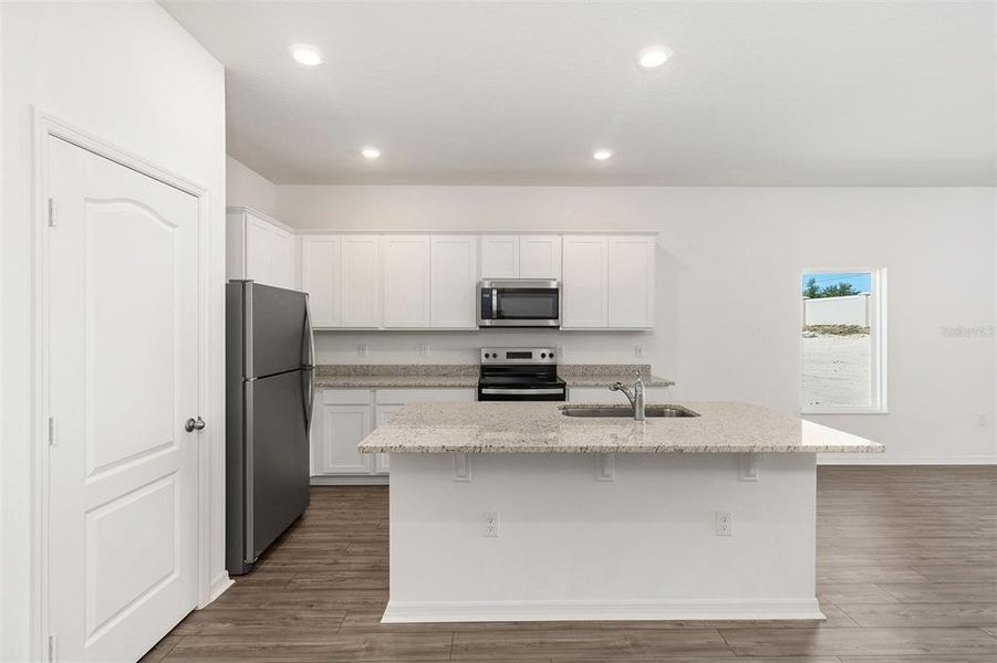 Furnished interior view inside a new home in Peach Crossings, Winter Haven (Image 8).