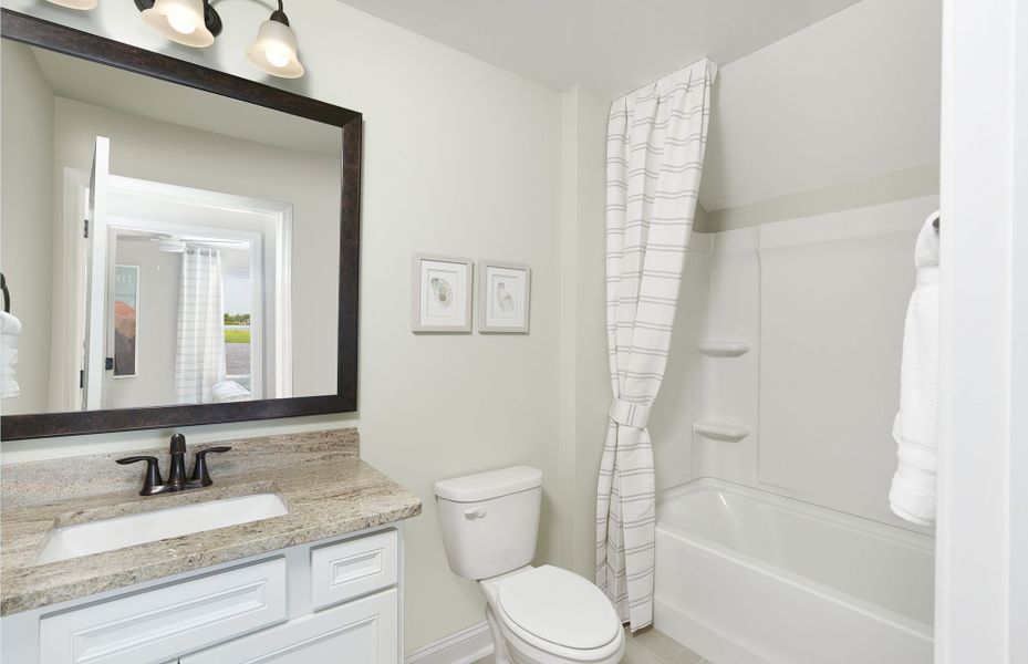 Secondary Bathroom with a soaking tub for relaxation.