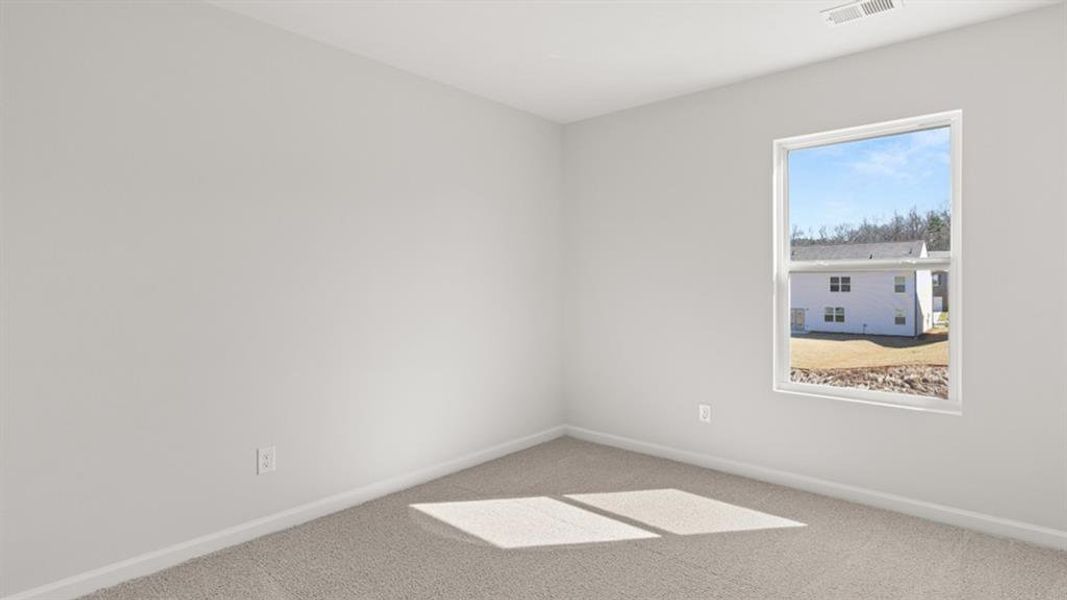 Spacious, unfurnished interior of a new home in Oaks at Cedar Grove, Fairburn (Image 29).