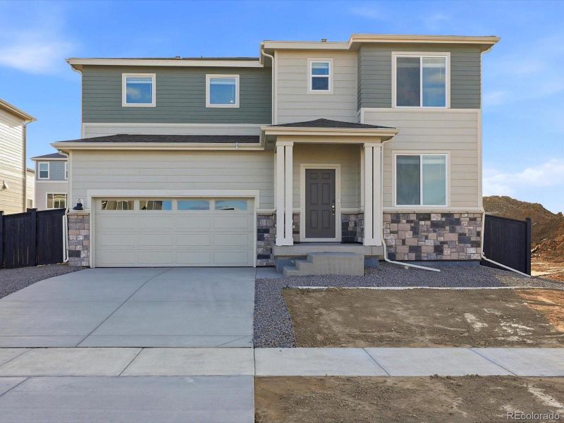Front exterior of a new home in Westgate, Greeley, CO, highlighting curb appeal (Image 1). Front exterior of a new home in Westgate, Greeley, CO, highlighting curb appeal (Image 1).