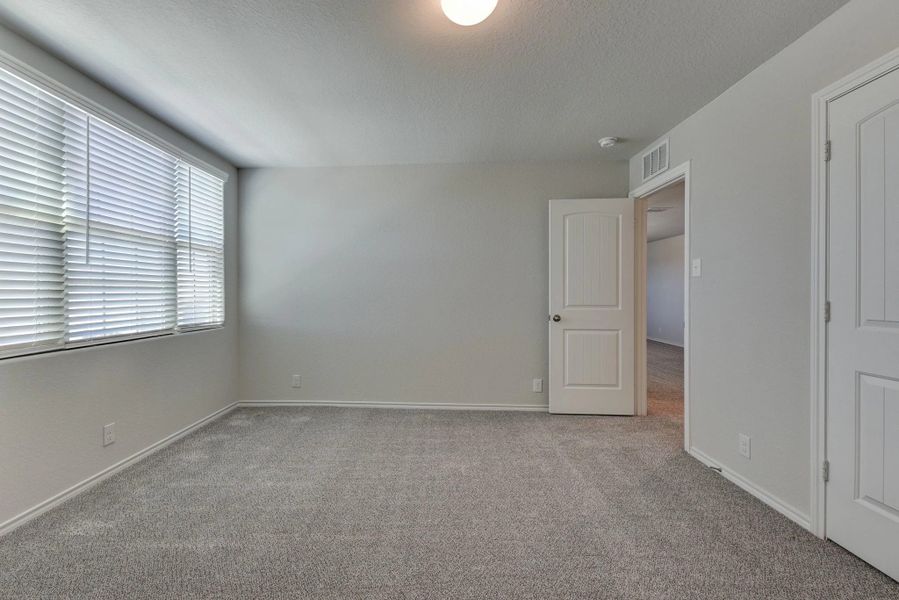 Representative unfurnished interior of a home built from the Devon by Ashton Woods in Cordova Trails, Seguin (Image 26).